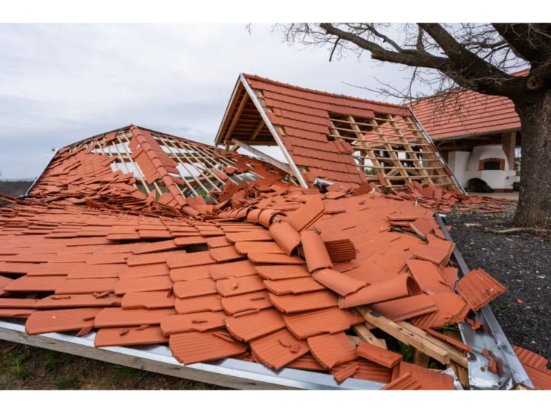Broken roof after a storm Broken roof after a storm